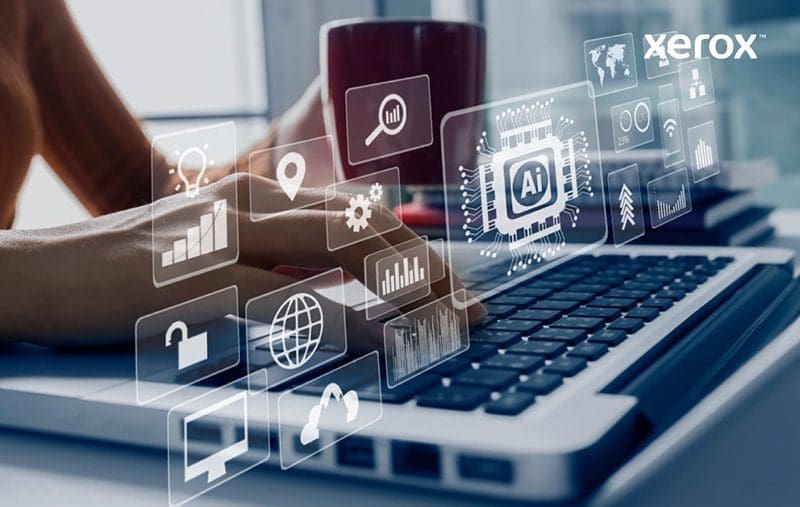Hands typing on a laptop with digital icons symbolizing AI and data analytics overlayed. Hands typing on a laptop with digital icons symbolizing AI and data analytics overlayed.